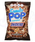 Front of Candy Pop Snickers Popcorn 5.25oz bag showing chocolate-drizzled popcorn with Snickers branding